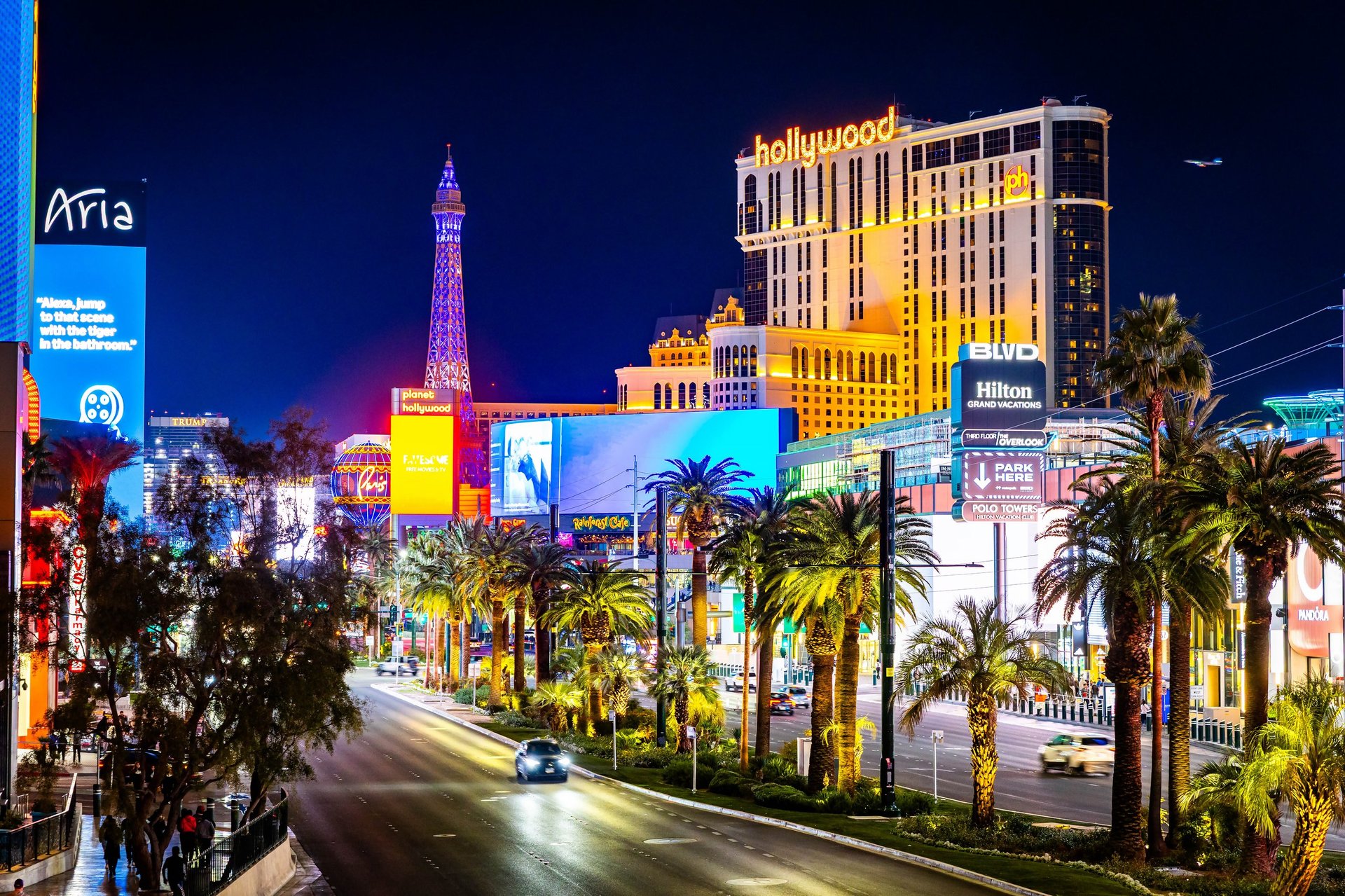 Colorful illuminated view of the Las Vegas Strip at night from Las Vegas Boulevard in Nevada